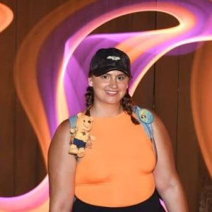 Colorful glow backdrop at 407 and Beyond Vacation Co. event.